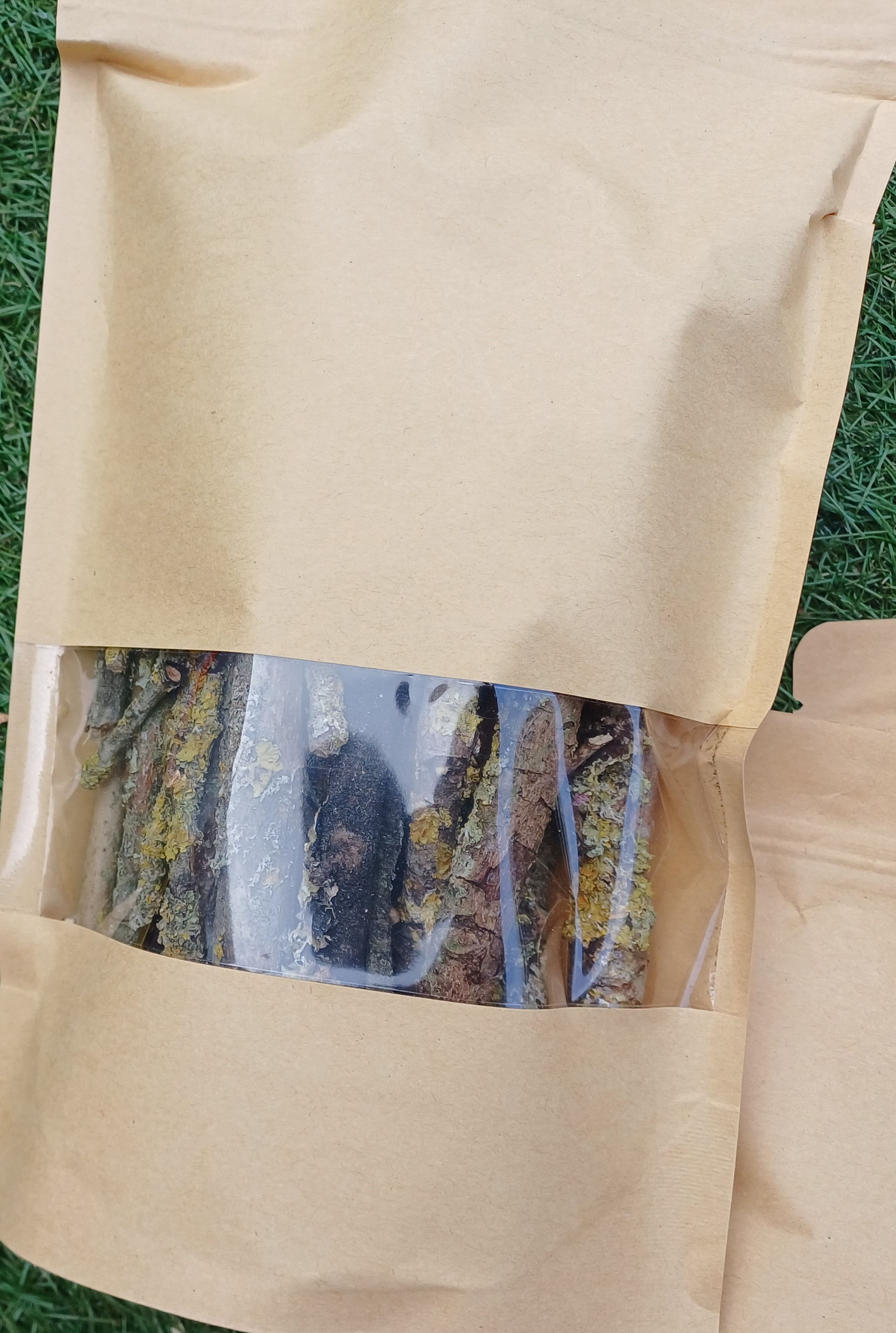 Brown bag of lichen sticks
