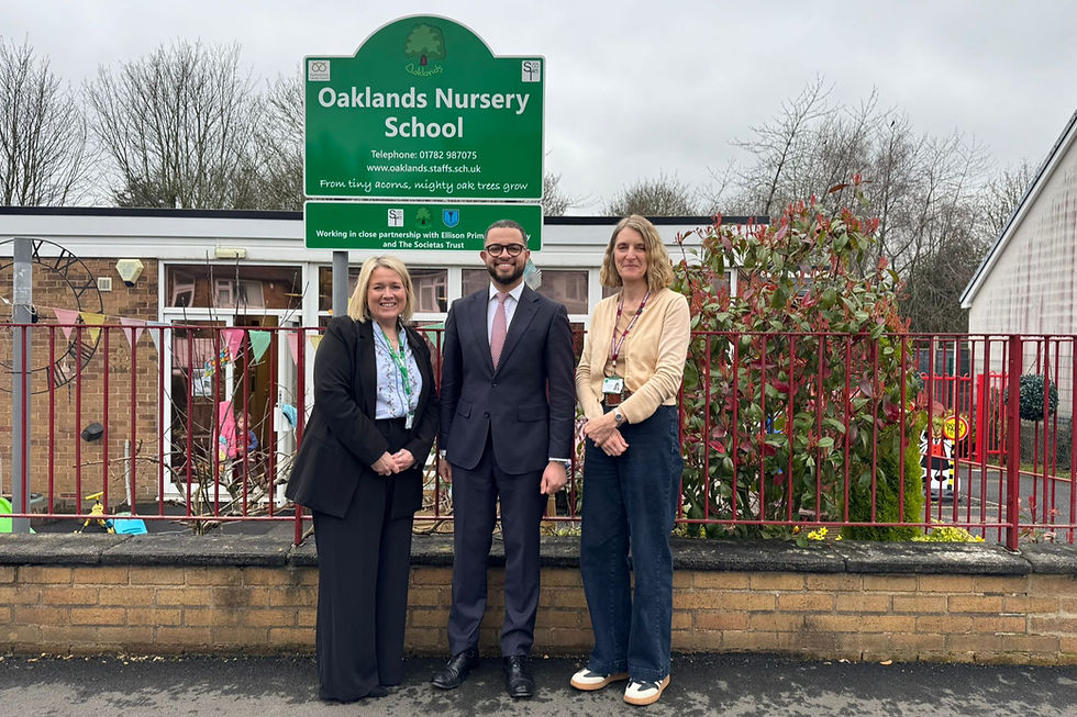 Adam Jogee alongside Oaklands Nursery School staff on a recent visit