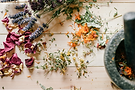 dried herbs on a wooden table