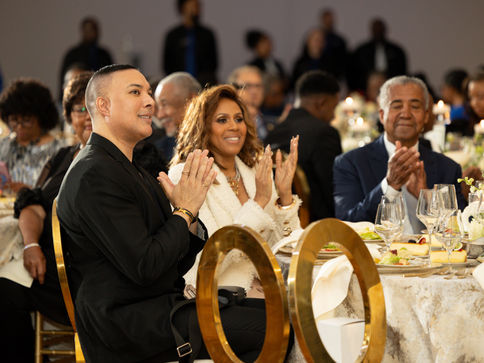 Deborah Cox and guest clapping