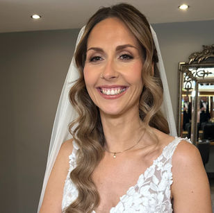 Brunette bride with her softly defined eyes and radiant skin