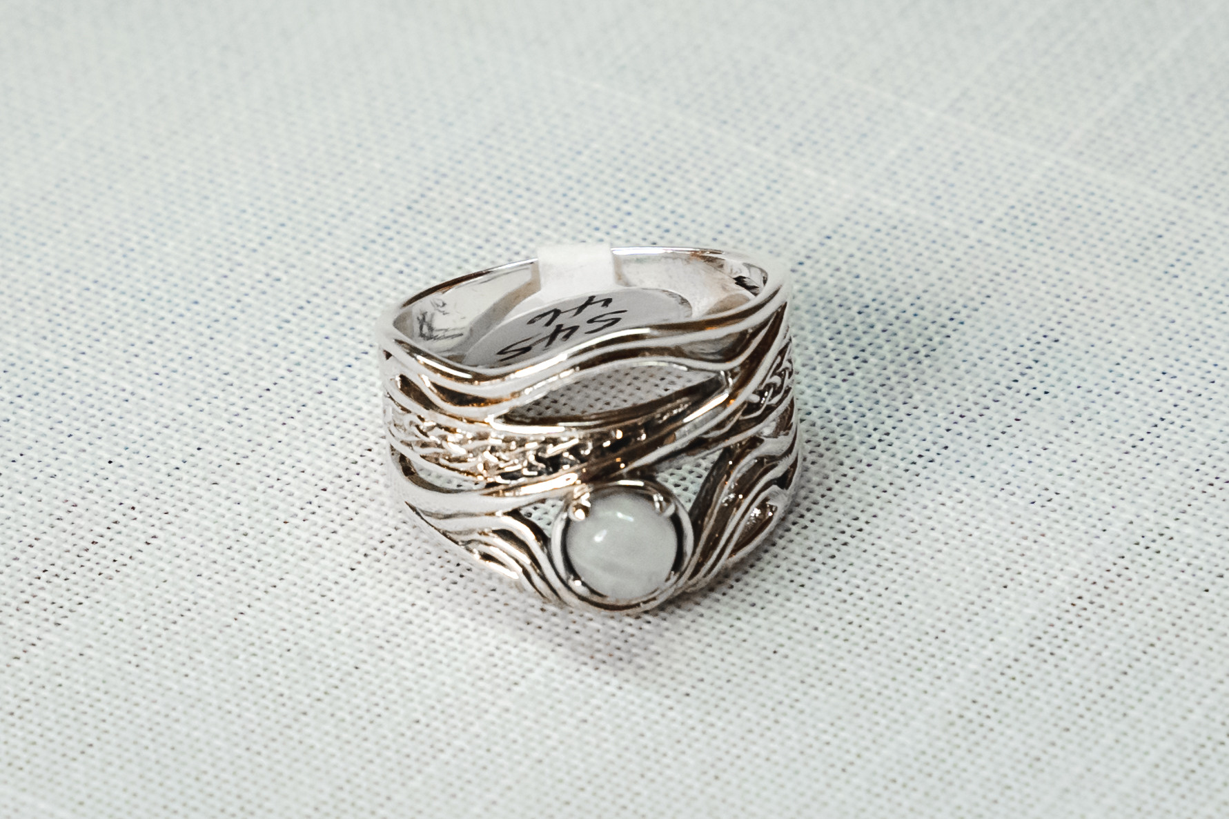 Silver ring with gemstone
