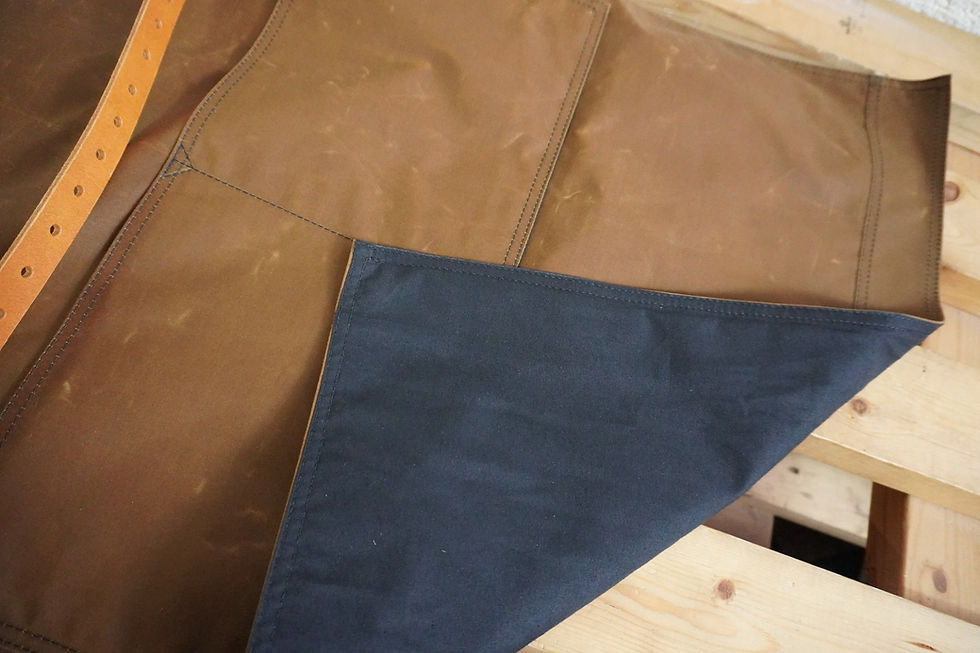 Thumbnail: Waxed cotton and leather apron by 1874 Works