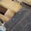 Thumbnail: Product shot of a waxed cotton and leather Apron by 1874 Works
