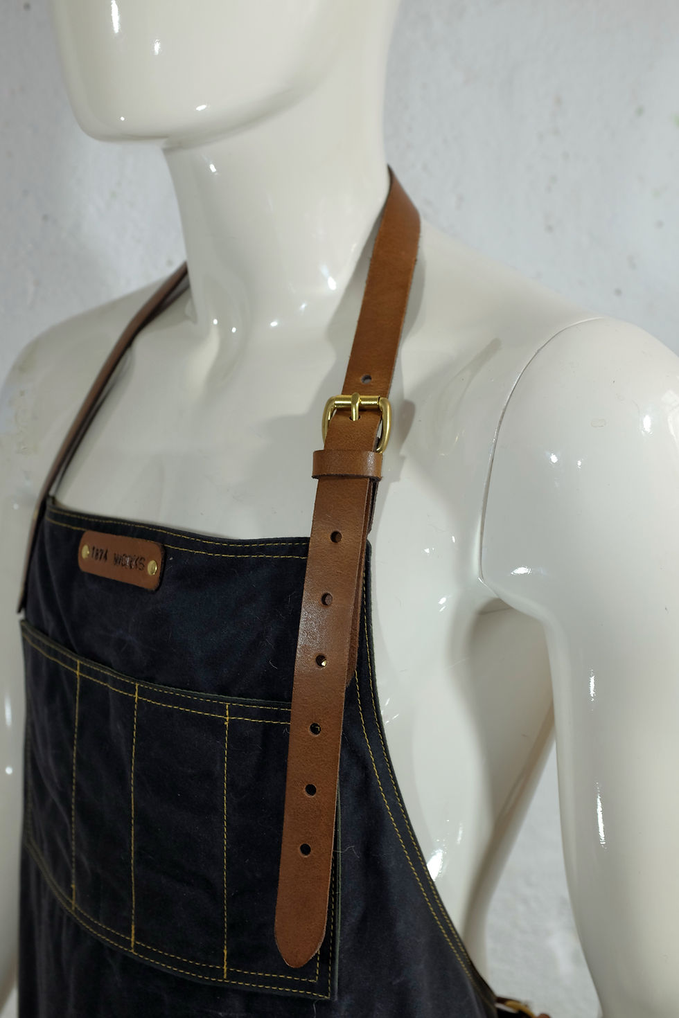 Thumbnail: Waxed cotton and leather apron by 1874 Works