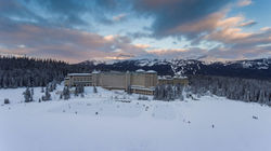 Winter_Aerial_View_of_Fairmont_Chateau_Lake_Louise_with_ski_hill_1024719_high