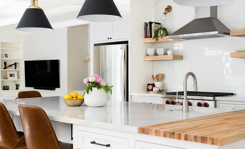 Folsom Kitchen black chandelier sink faucet white chairs table tv interior design Folsom Kitchen black chandelier sink faucet white chairs table tv interior design