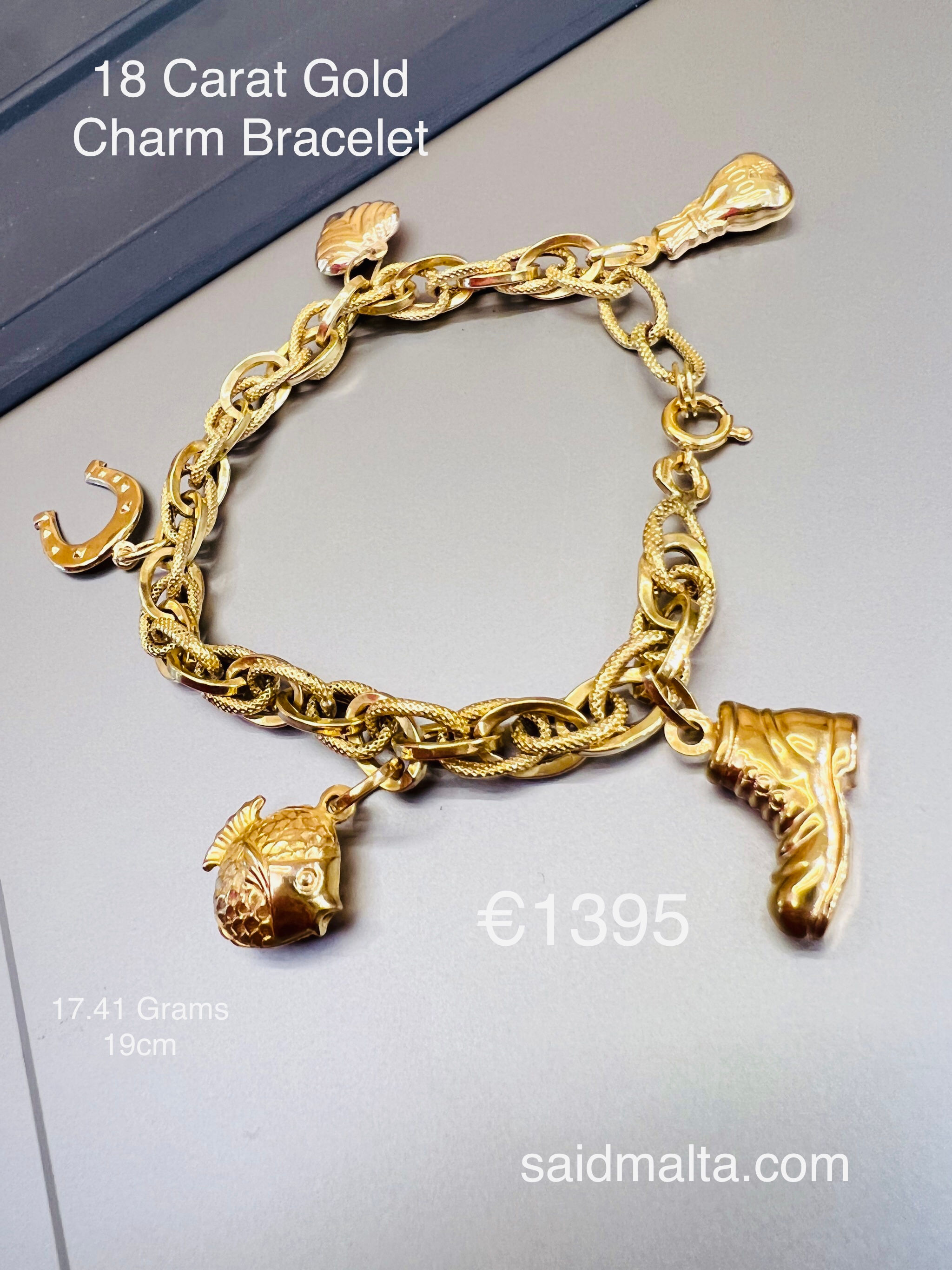 18 Carat Gold Charm bracelet
