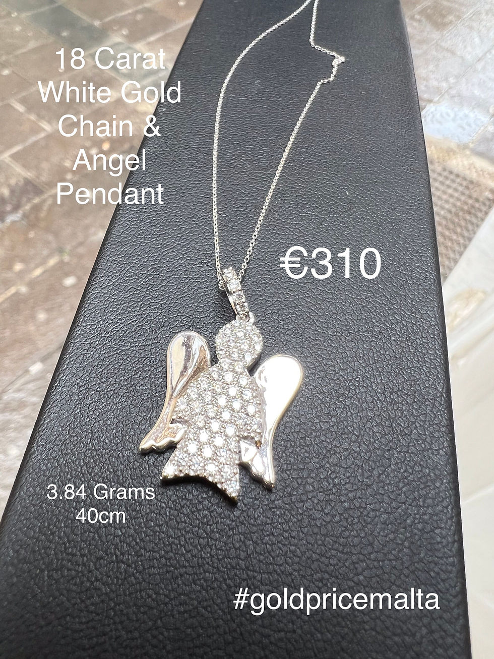 18 Carat White Gold Chain & Angel Pendant