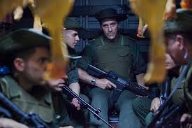 Group iof men holding guns