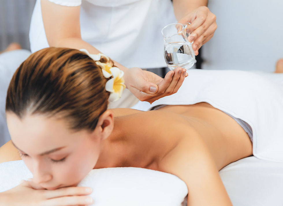 Woman receiving aromatherapy massage at Thai Wellness Sanctuary