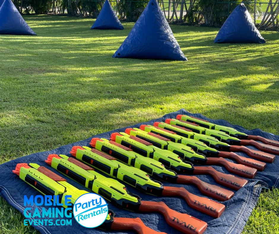 NERF party equipment showing blasters, playing-area barriers or participants during an outdoor team game.