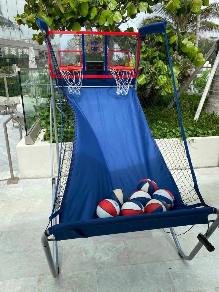 Two-player basketball shootout with two hoops and basketballs