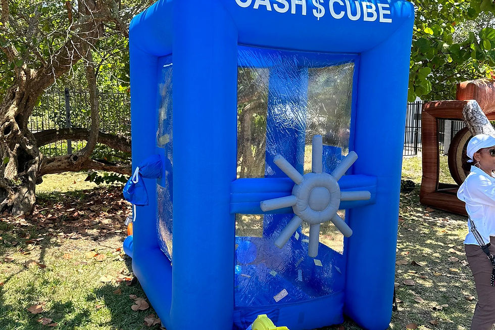 blue inflatable Cash Cube rental setup from Mobile Gaming Events showing the full money machine booth and event-ready inflatable structure for Fort Lauderdale, Broward County, and South Florida. This Cash Cube rental is relevant for birthday parties, corporate events, school events, HOA events, community celebrations, company parties, trade shows, festivals, and interactive event entertainment. Mobile Gaming Events provides mobile party and event rentals with setup brought to the event location. Call or text 954-408-1881 for availability.