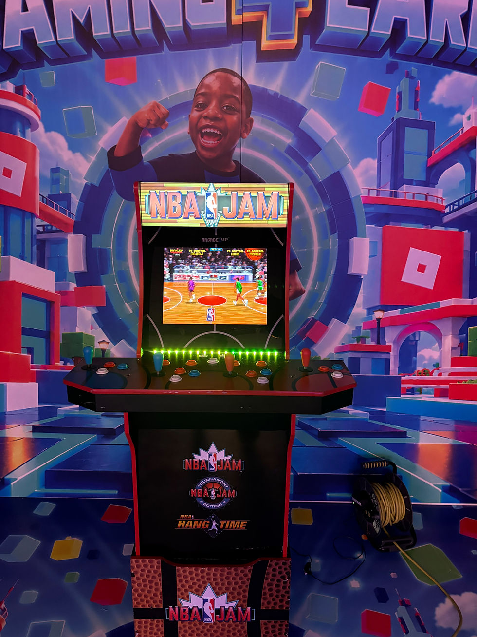 NBA Jam standup arcade cabinet in front of a basketball-themed backdrop