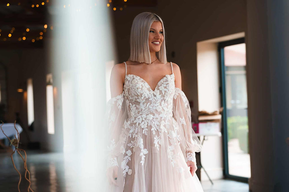 Bride smiling at groom during wedding ceremony at The Hidden Oak wedding venue Mick Merriott Photogr