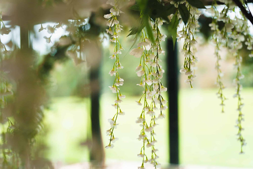 Floral wedding reception decorations at The Hidden Oak wedding venue Stockon Mick Merriott Photogra