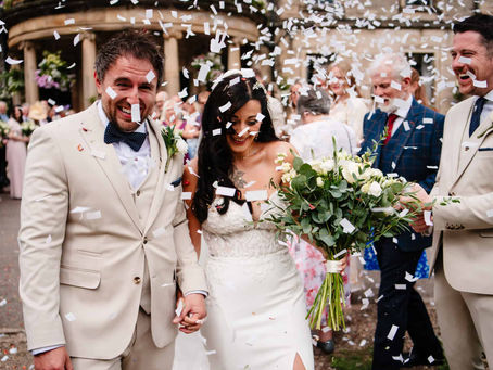 bride and groom confetti photo at beamish hall wedding venue