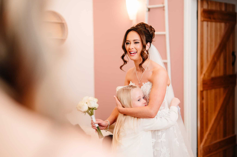 bride hugging daughter on wedding morning prep Documentary wedding photography Teesside winter wedding