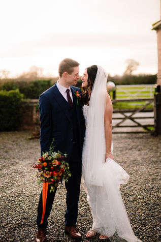 bride and groom at sunset thirsk lodge barns