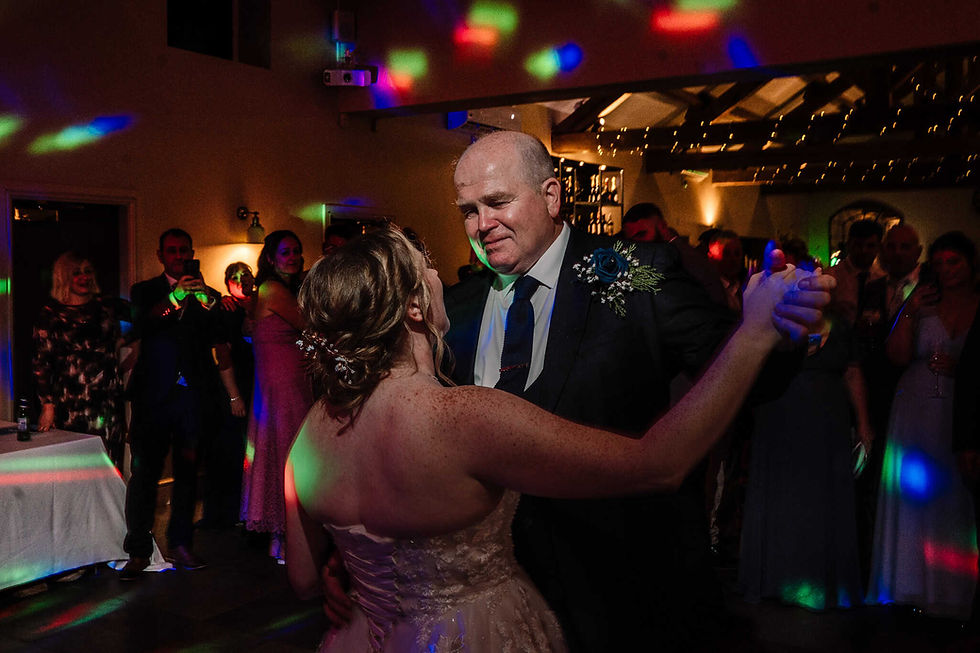 bride and dad first dance at the hidden oak wedding venue