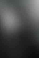 black and white photo guests laughing candid during evening reception at grand villa heights