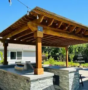 Wood patio cover installation by Fence Solutions