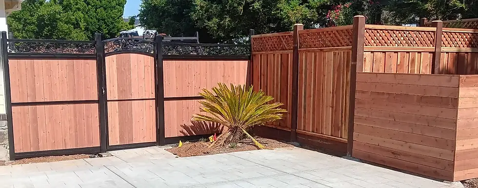 Redwood privacy fence with steel frame gate, installed by Fence Solutions