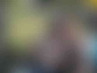 Trans guy and trans woman. The trans guy is shirtless.