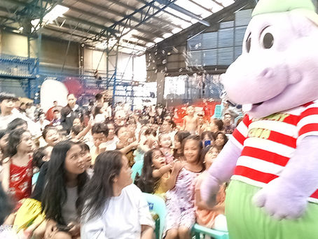 Happy children with Chummy Chum around