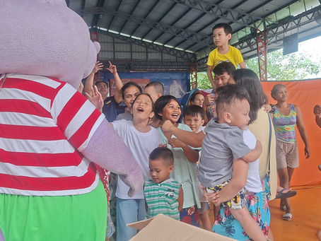 Happy children with Chummy Chum around