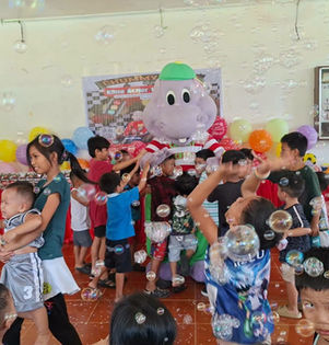 Happy children with Chummy Chum around