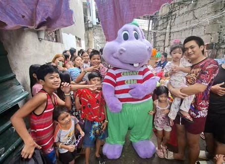 Happy children with Chummy Chum arouund