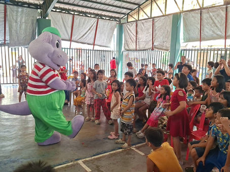 Happy children with Chummy Chum around