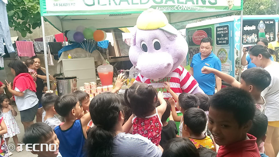 bringing joy to the children from Brgy. Marulas.jpg