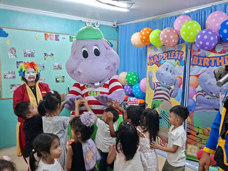 Happy children with Chummy Chum aroun