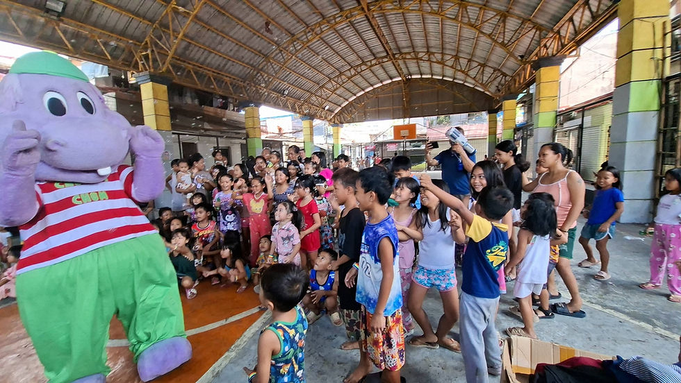 Happy children with Chummy Chum around