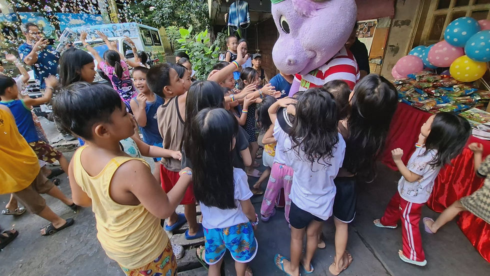 Happy children with Chummy Chum around