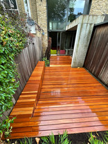 Bilau hardwood decking towards the house wet.JPEG