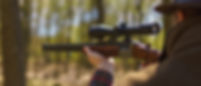 hunter-man-aiming-with-rifle-gun-on-prey-in-forest-2022-11-15-02-08-26-utc.jpeg
