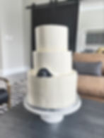 Three-Tier Wedding Cake with Dog Head Detail