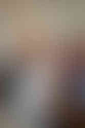 A bride hugging her flower girl