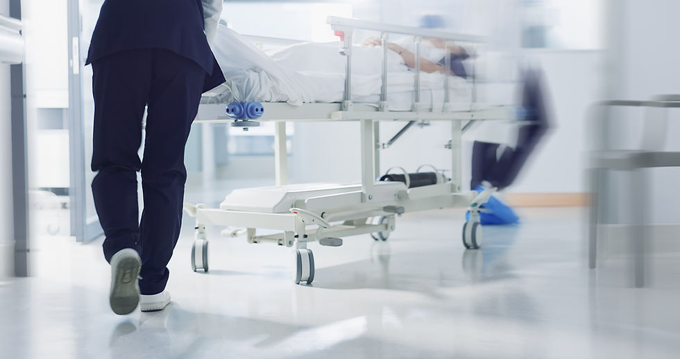 medical-team-moves-patient-in-hospital-bed-2026-09-24-12-12-55-utc.jpg