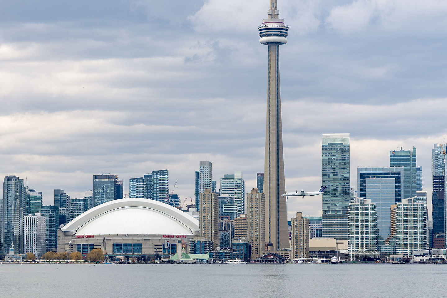 The CN Tower and the Toronto city skyline at dusk, representing Canada's home-grown technology and talent