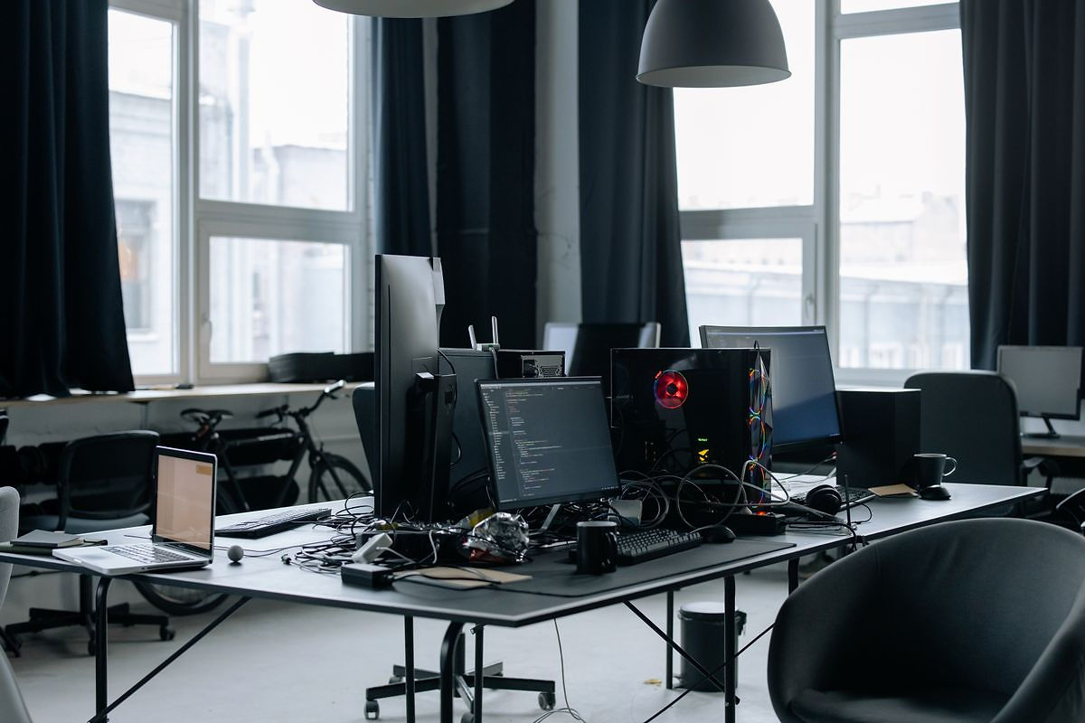 AI bookkeeping software automating transactions on a modern workspace