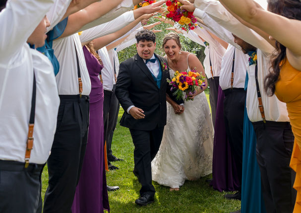 calgary-wedding-florist-colourful-bridal-bouquet-wildflower-style-outdoor-ceremony-arch-flowers-romantic-alberta-morning-glory-and-grace