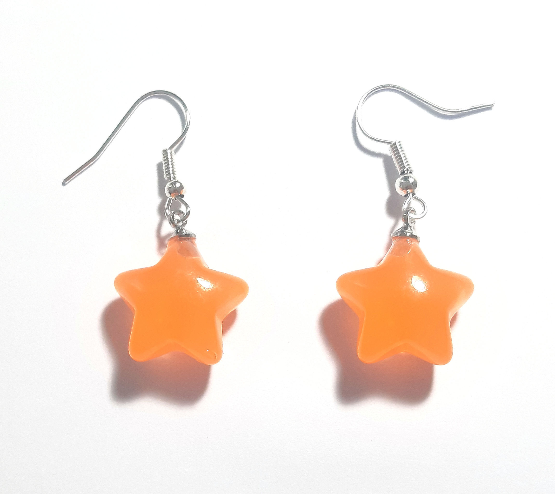 brinco de estrela laranja