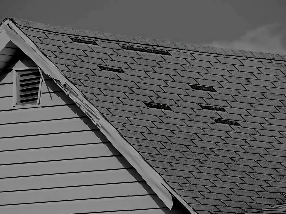 Wind Damage to Asphalt Shingles