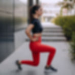 a women wearing sportswear legging and crop top