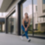 An athlete girl wears promise athletic legging and bra made by AEM Textile